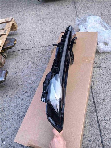 Zespół lewej przedniej lampy sygnalizacyjnej